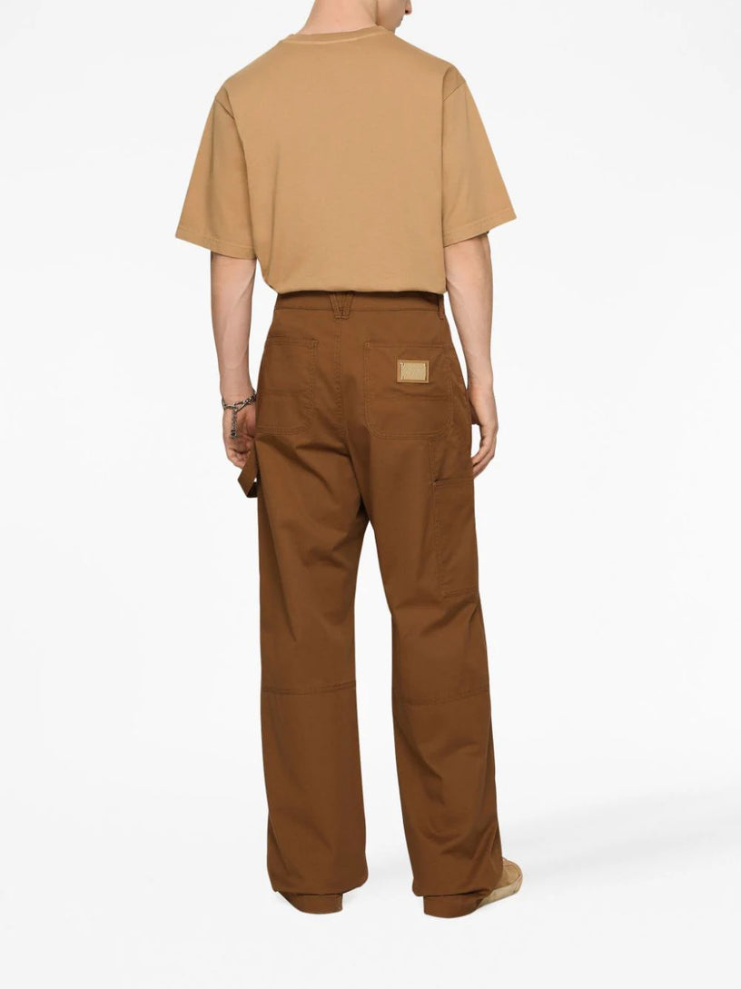 Worker pants with brand plate