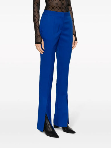 Tailored trousers with slit