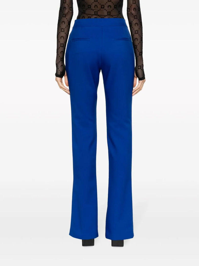 Tailored trousers with slit