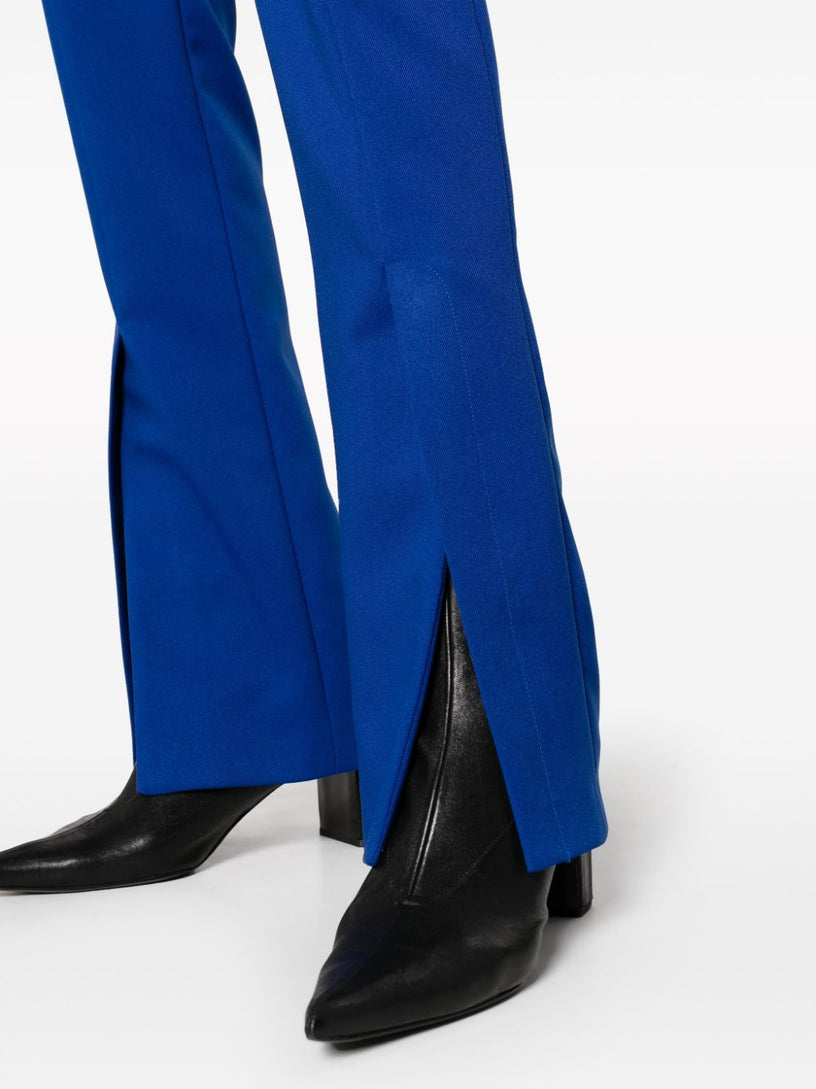 Tailored trousers with slit