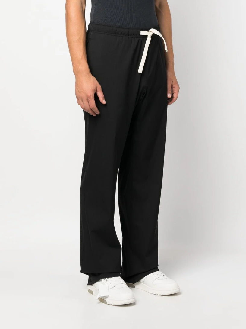 Straight trousers with monogram embroidery