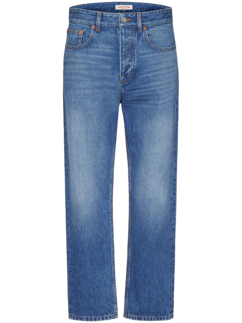 Valentino Garavani Denim trousers with embossed vlogo signature