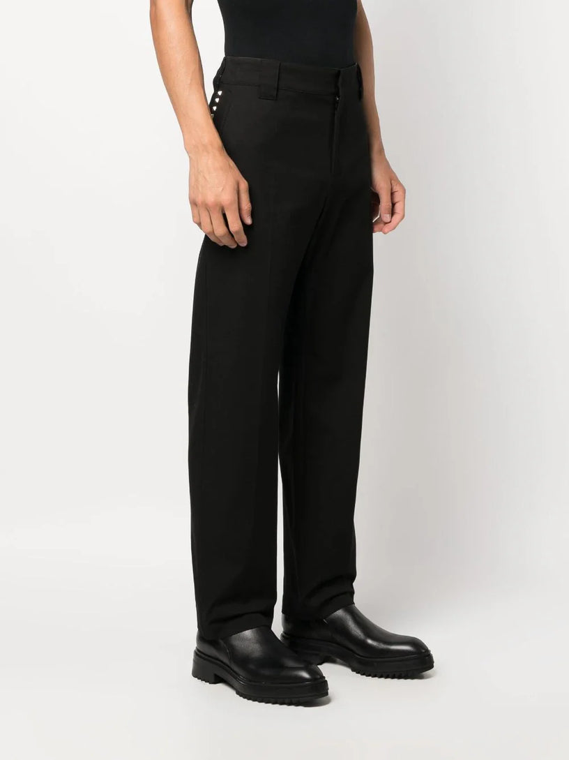 Trousers with Untitled studs