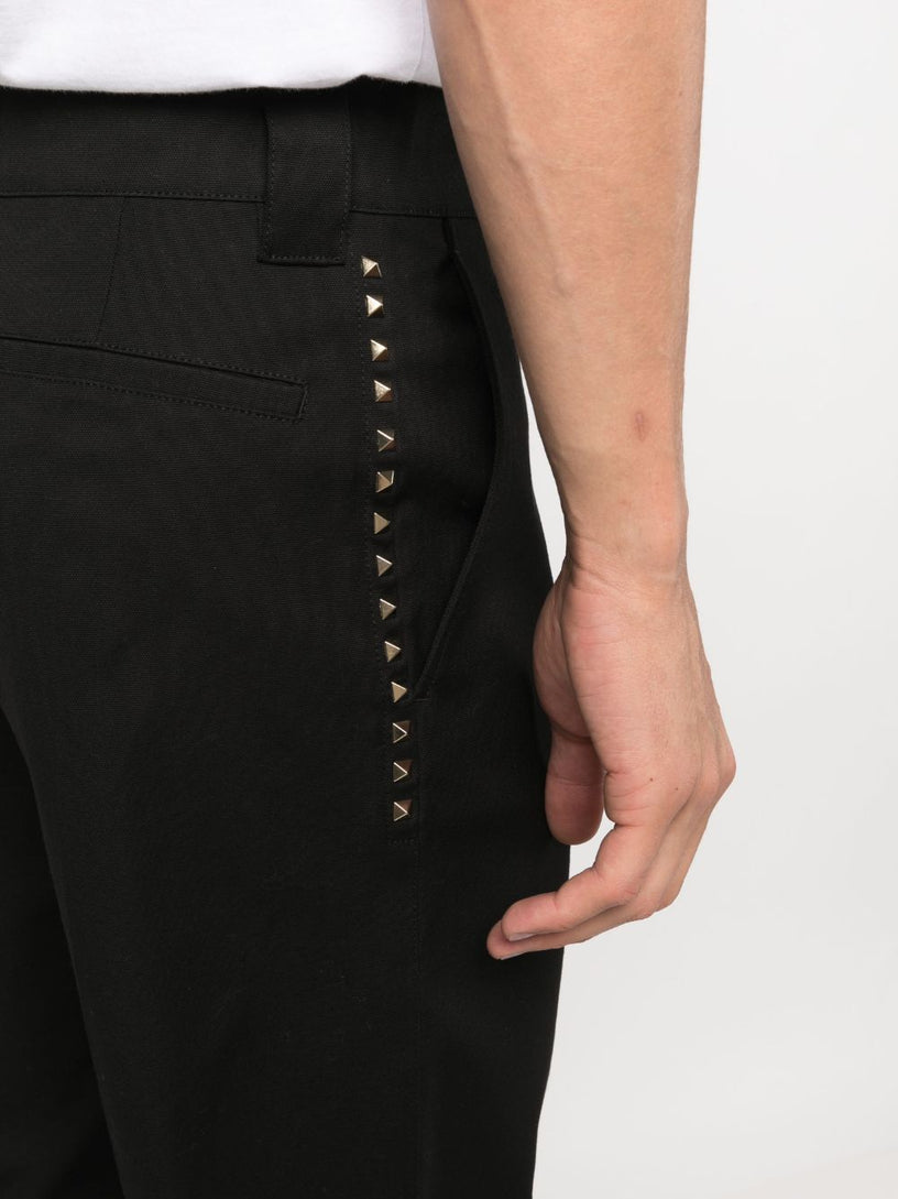 Trousers with Untitled studs