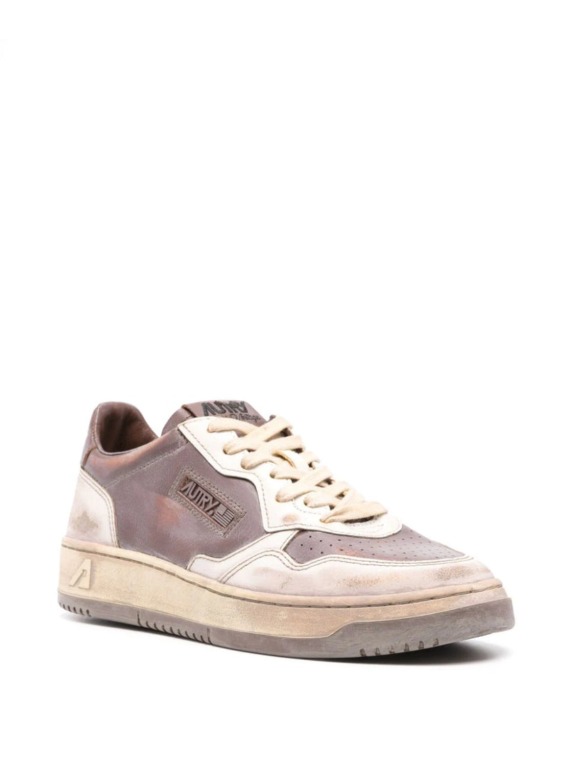 Super vintage low sneakers in white leather and mud patridge