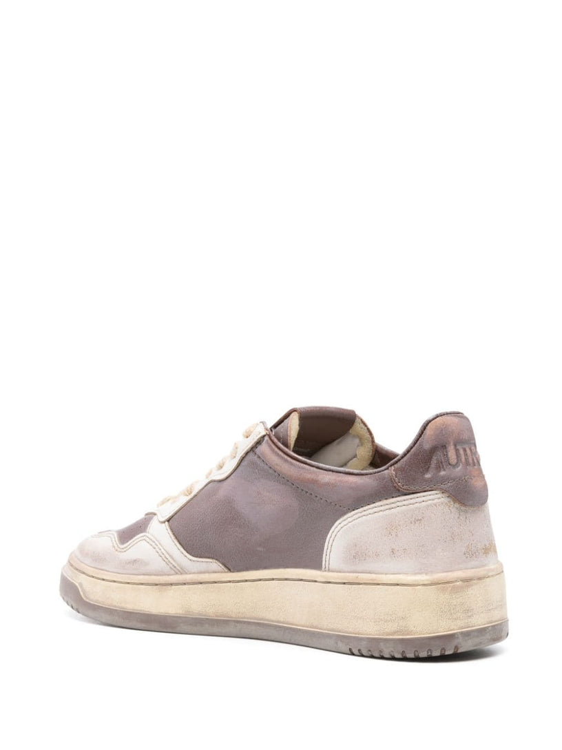 Super vintage low sneakers in white leather and mud patridge