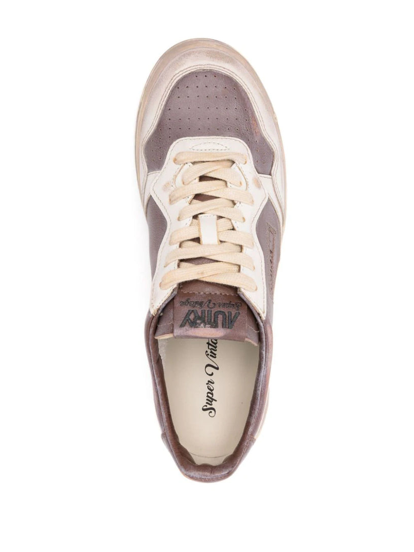 Super vintage low sneakers in white leather and mud patridge