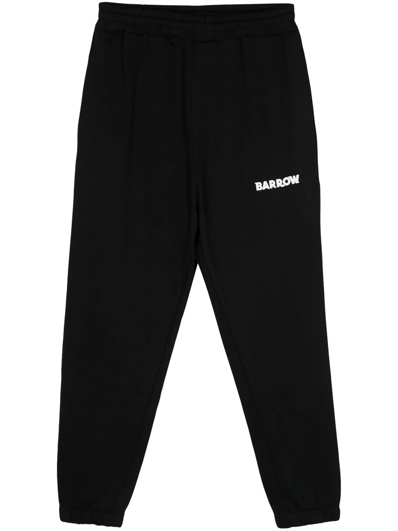 Sports trousers with rubberized logo