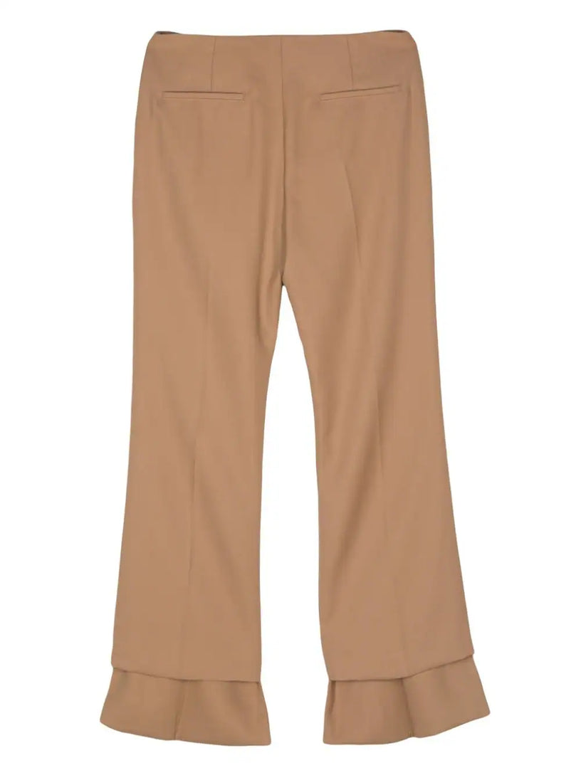 Trousers with asymmetric hem in grain de poudre wool