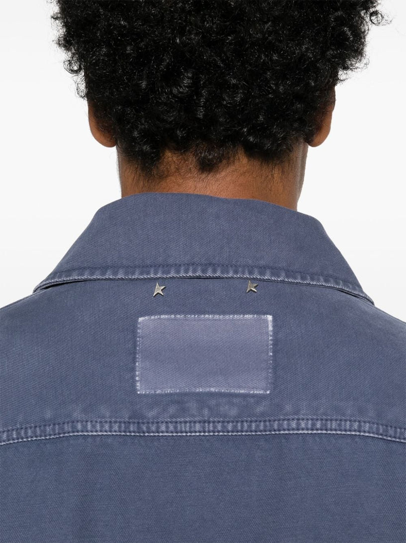 Blue denim cotton jacket with distressed treatment