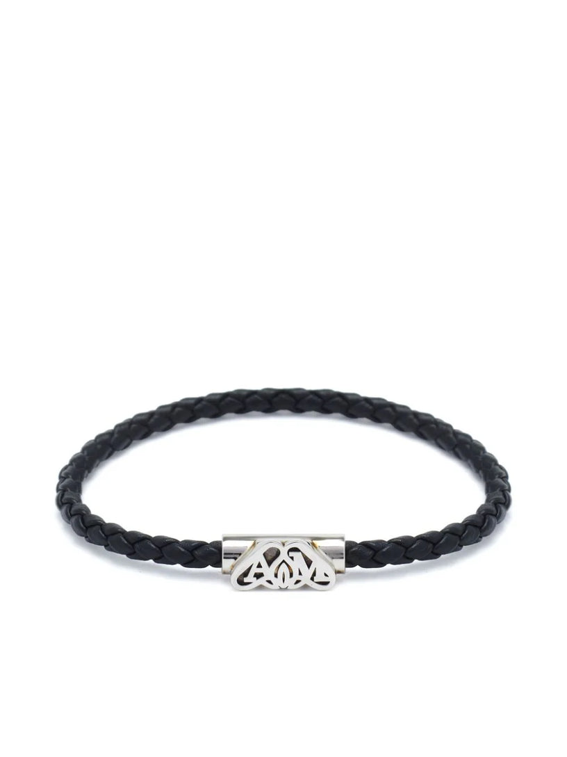 Alexander McQueen Seal logo leather bracelet in black/antique silver