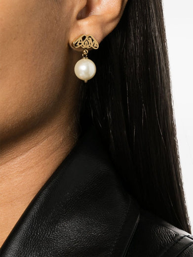 Pearl earrings with gold seal logo