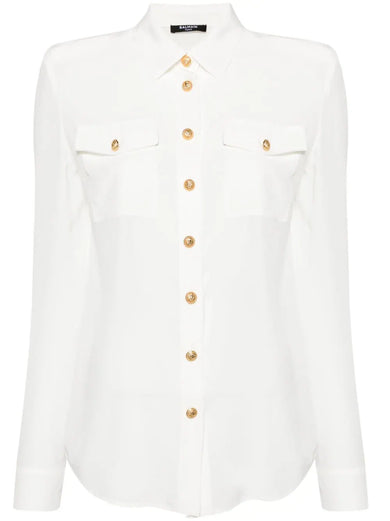 Shirt with golden buttons