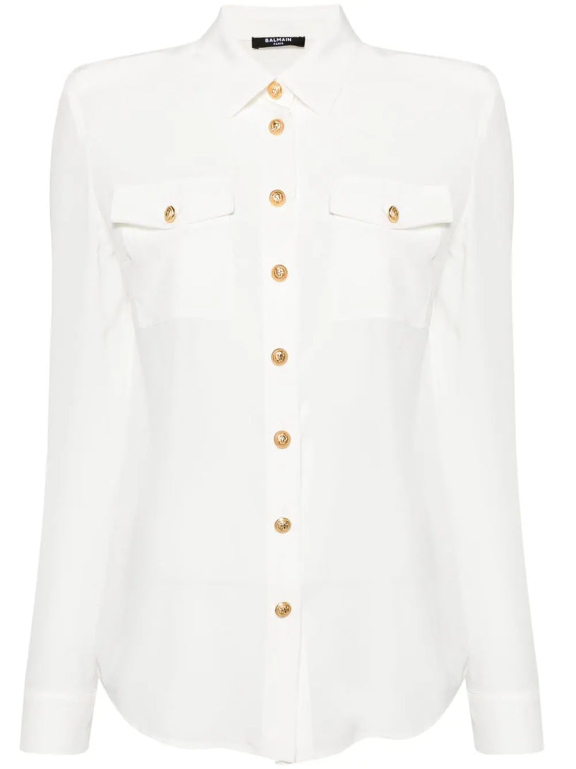 Shirt with golden buttons