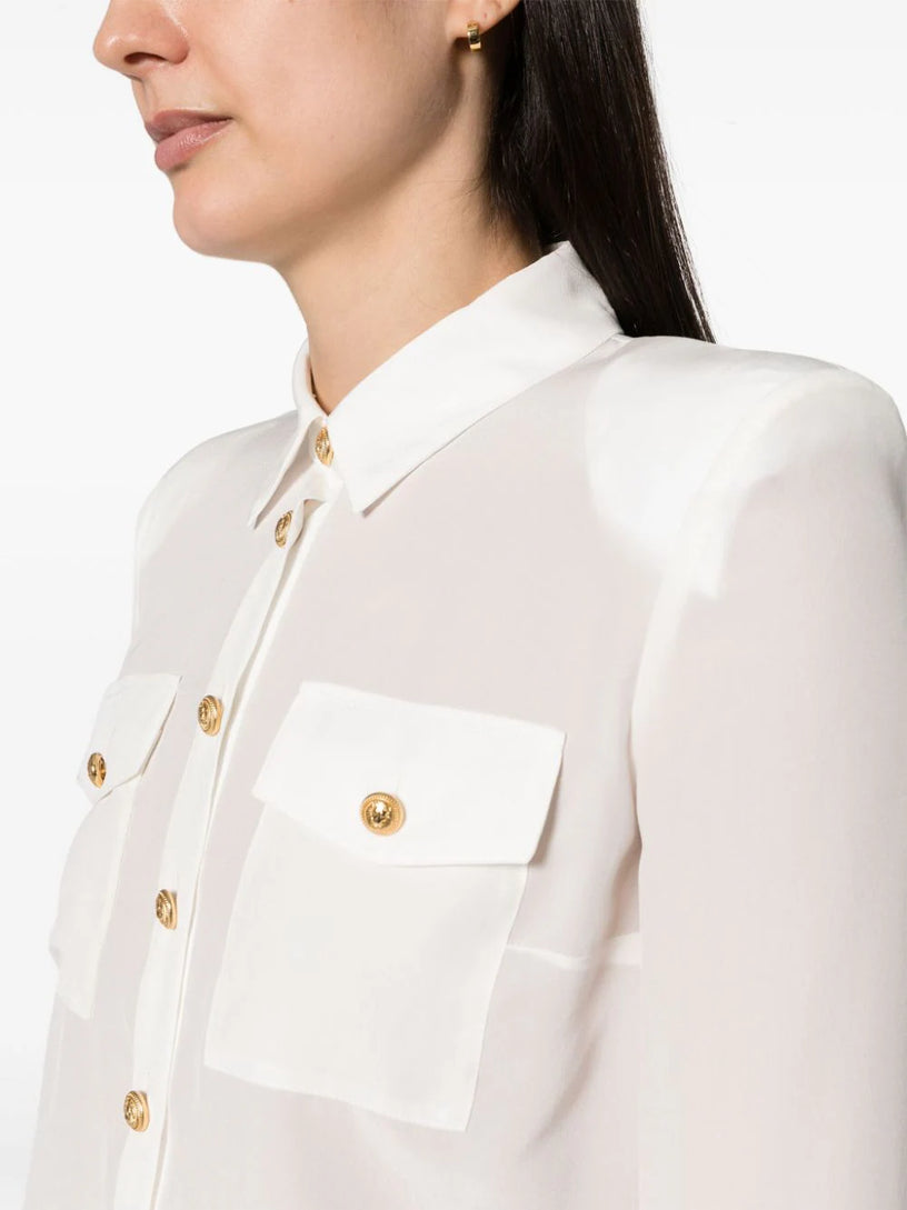 Shirt with golden buttons