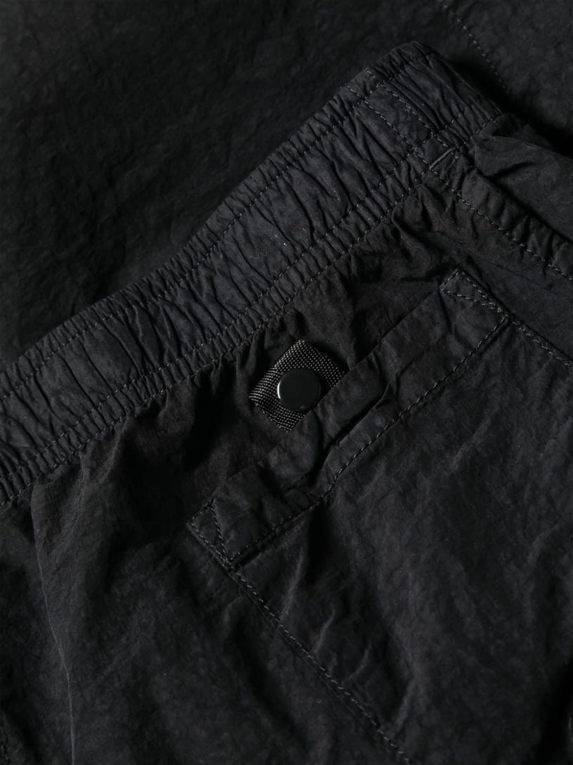 Swim shorts with lens detail