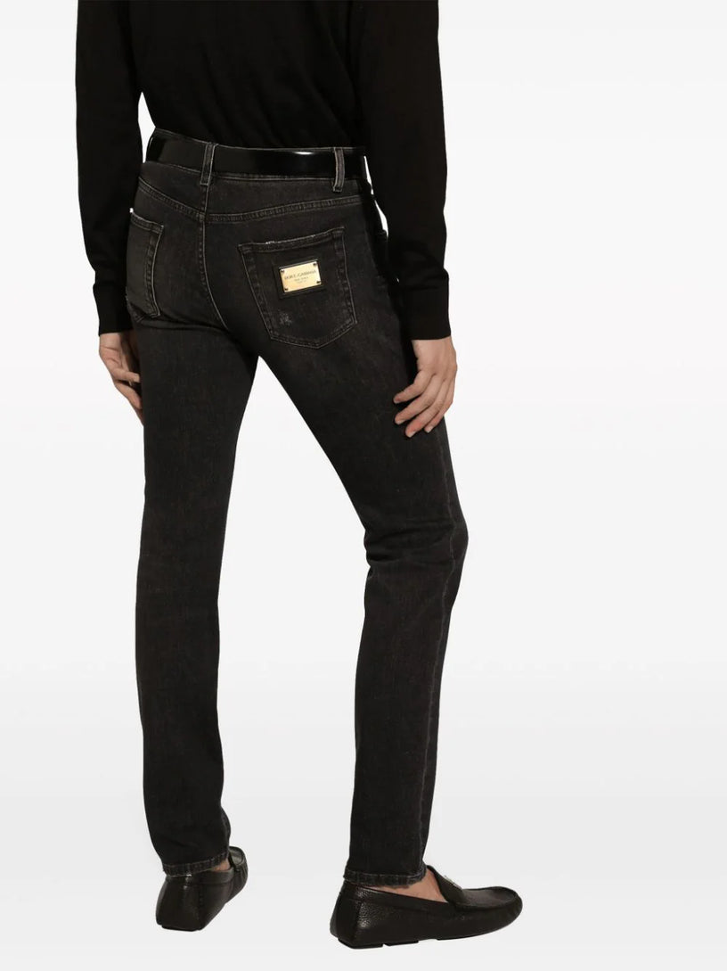 Slim-fit stretch denim jeans with abrasions