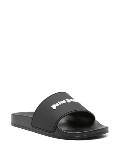 Slides sandals with embossed logo