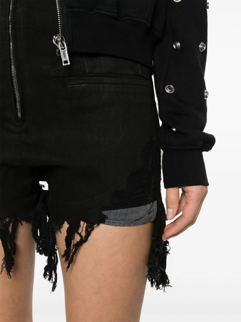 Dirt Cutoffs in black stretch denim