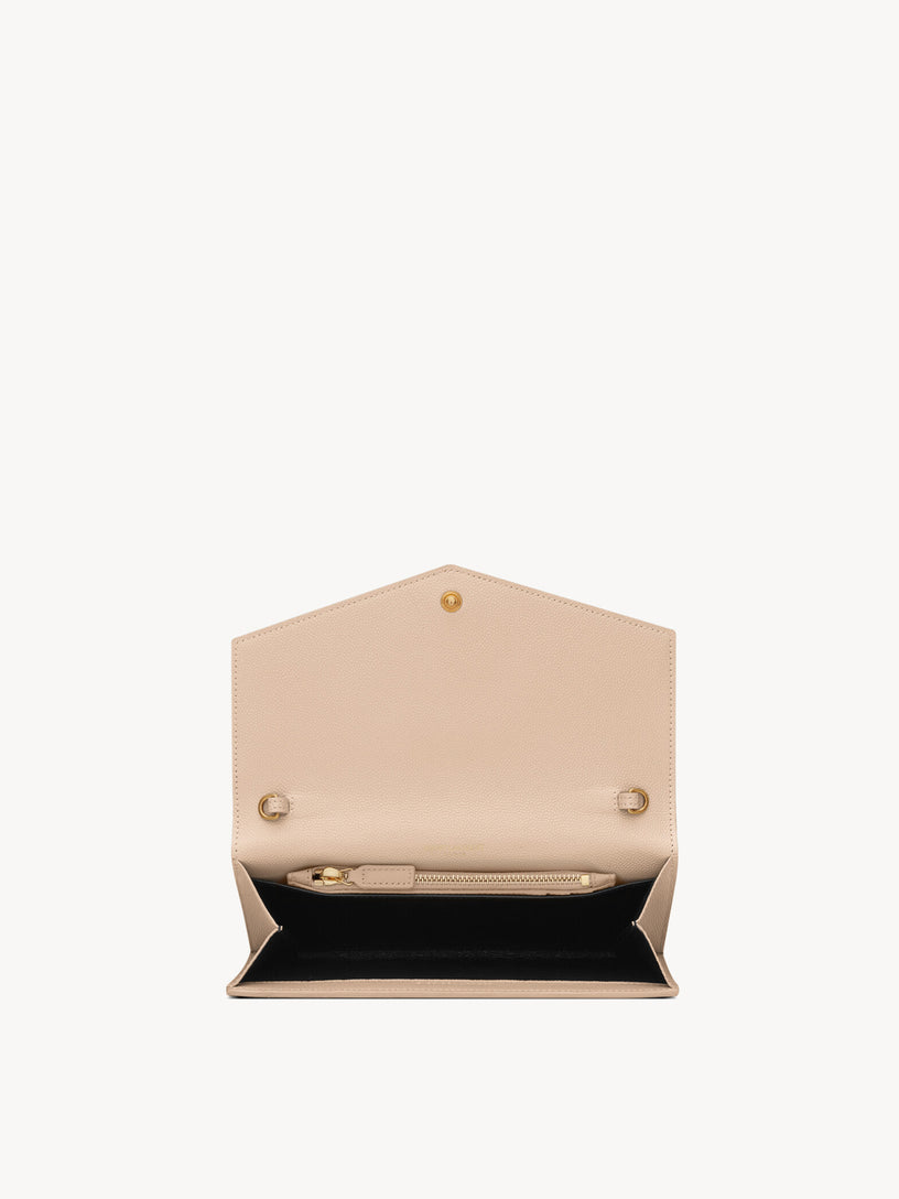 Uptown chain clutch bag in grain de poudre leather