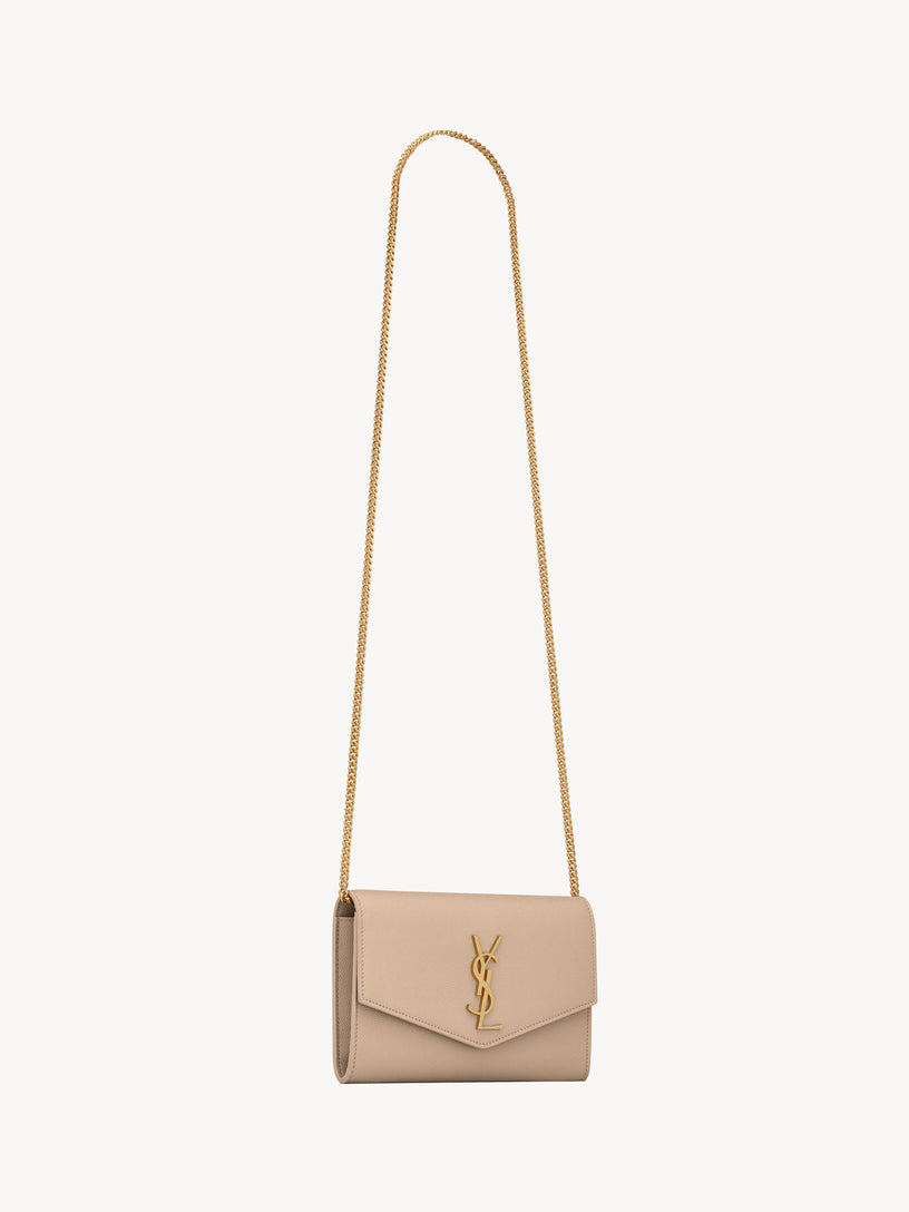 Uptown chain clutch bag in grain de poudre leather