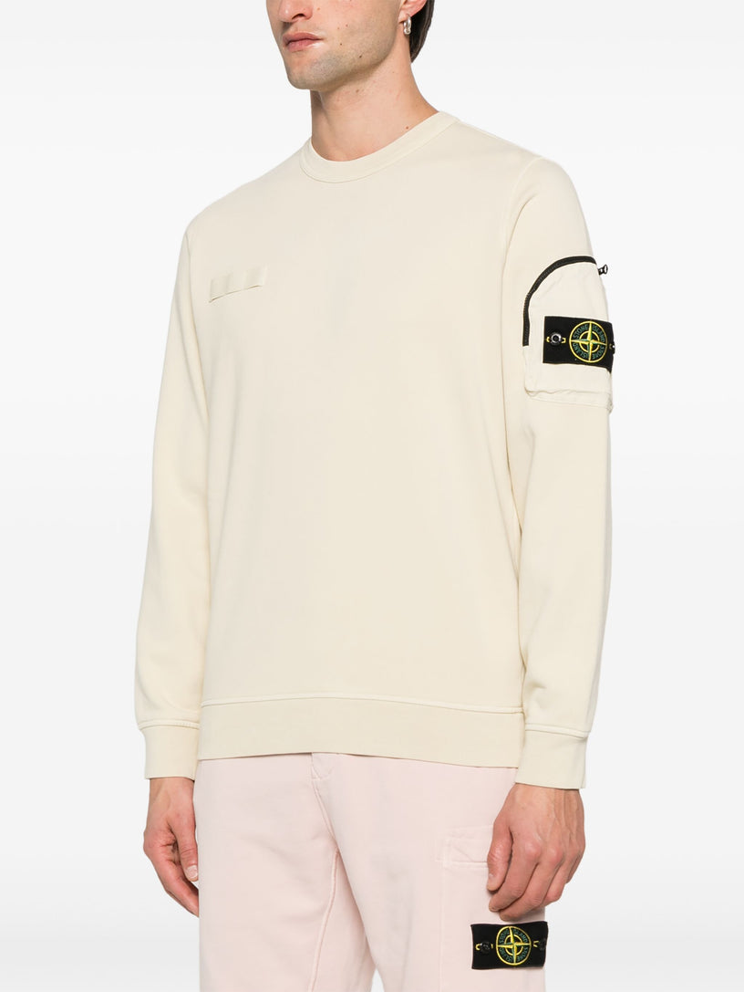 Sweatshirt with badge application