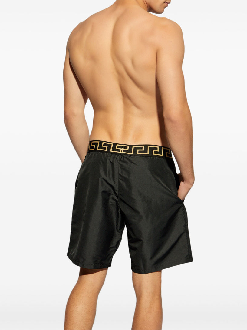 Swim shorts with Greca border